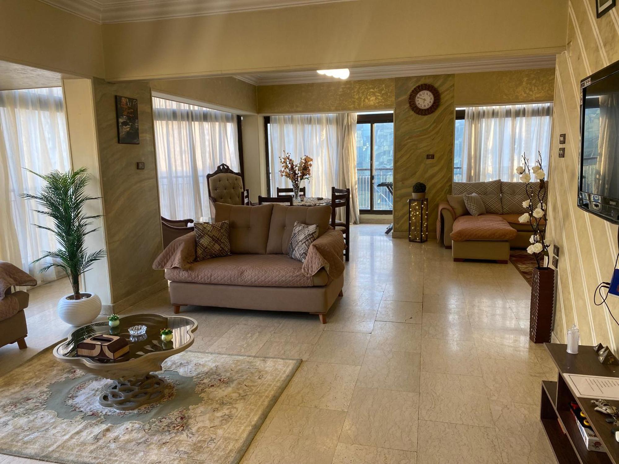 Апартаменты Nile View Dokki Каир Экстерьер фото